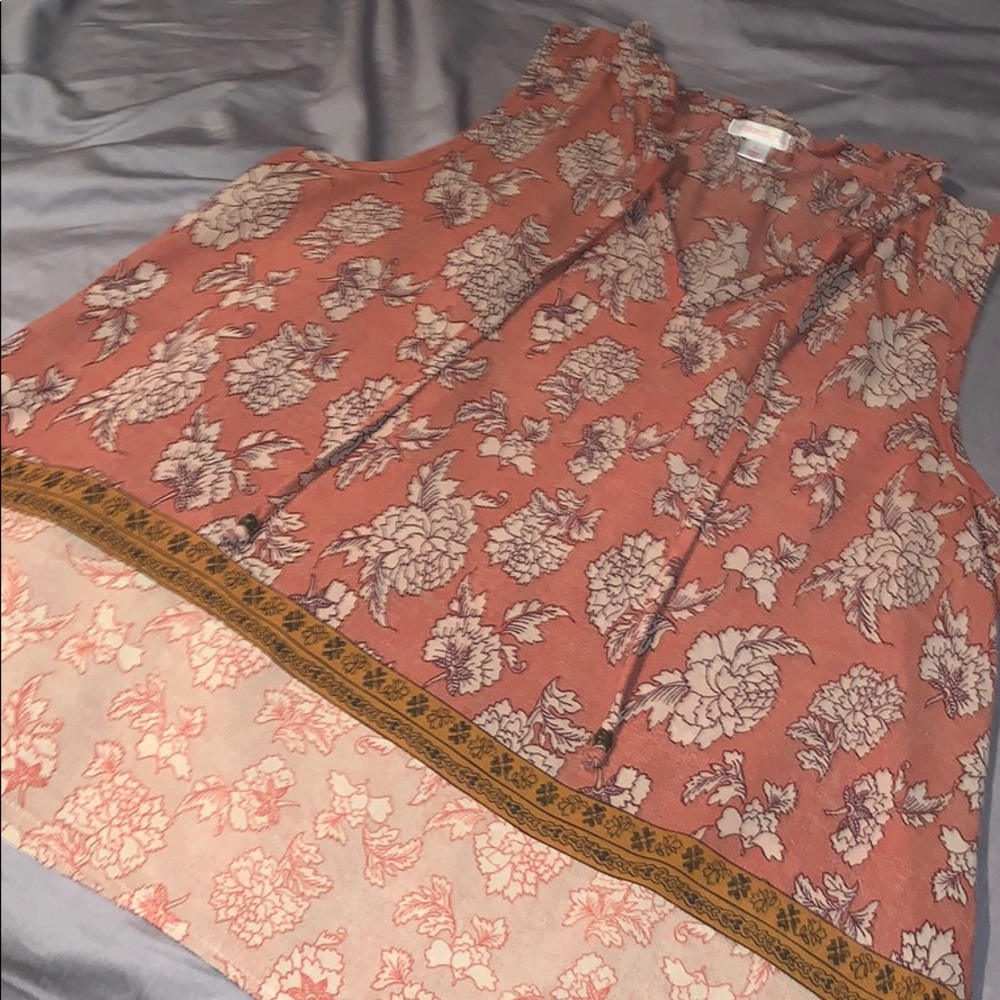 Sleeveless orange flower blouse
